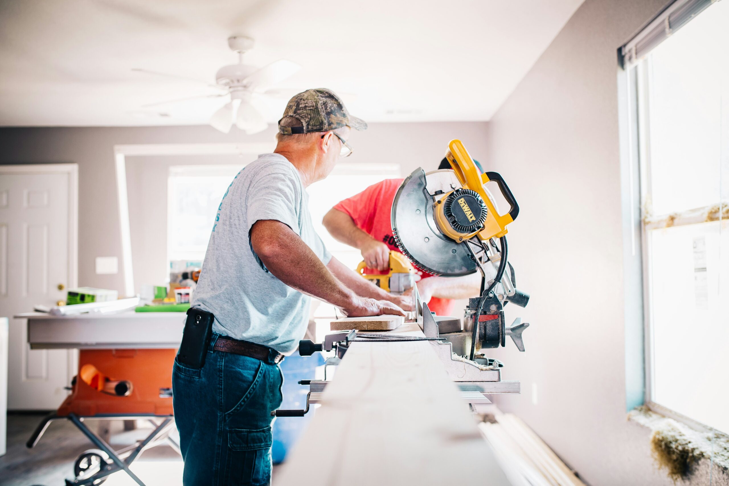 Carpenter using a DeWalt Power Saw